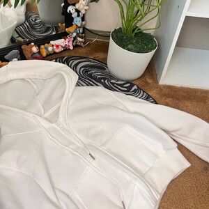 White cropped zip up with a hood
